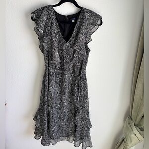 Elegant Tommy Hilfiger Black and White Mini Dress in size medium with ruffles